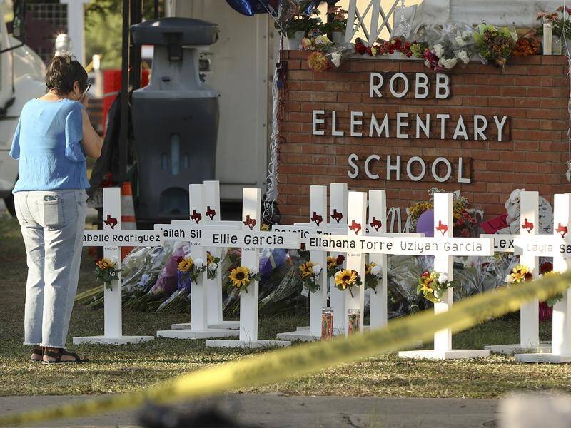 A memorial to the 19 children and two teachers killed at Robb Elementary School in Texas.