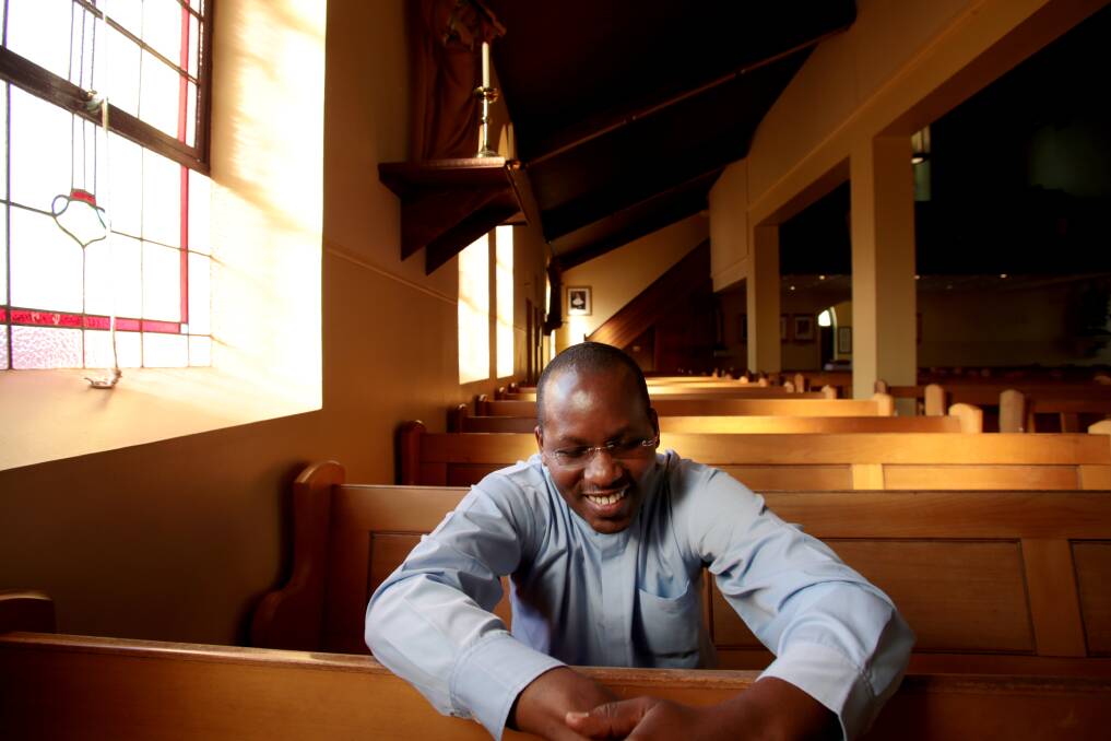 Applied Christianity: Rwandan genocide survivor Father Emmanuel Nsengiyumva brought his message of forgiveness to St Francis Xavier Cathedral in Wollongong on Friday night. Picture: ADAM McLEAN