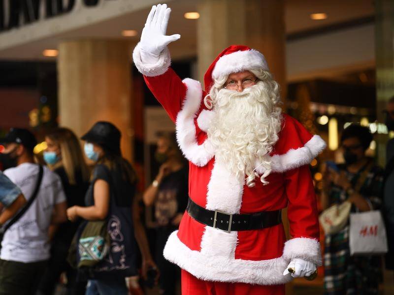 NSW retailers say it's time to allow more people inside shops to encourage Christmas spending.