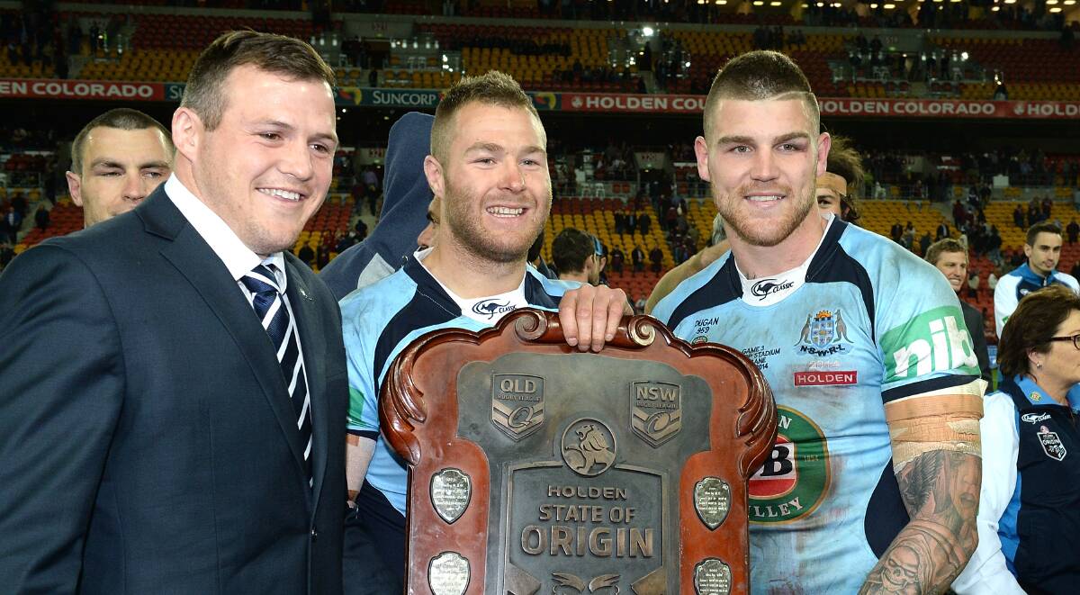 Brett Morris (left) is a Test certainty, while Trent Merrin (centre) and Josh Dugan are on the rise after achieving Origin success. Picture: GETTY IMAGES