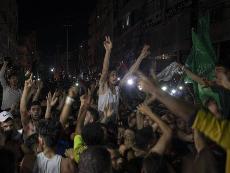 Palestinians poured into Gaza's streets following news of the ceasefire with Israel.