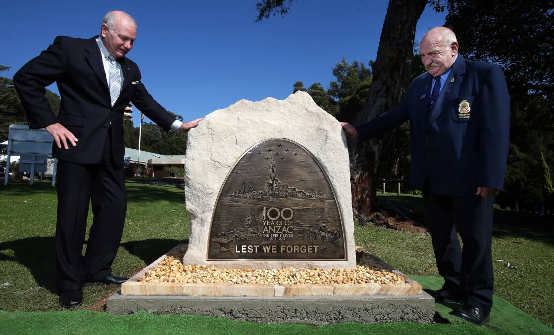 Wollongong Lord Mayor Gordon Bradbery and Wollongong RSL sub-branch president Peter Poulton check out the brass plaque at the Wollongong Memorial Gardens which commemorates the Centenary of Anzac.Picture: KIRK GILMOUR