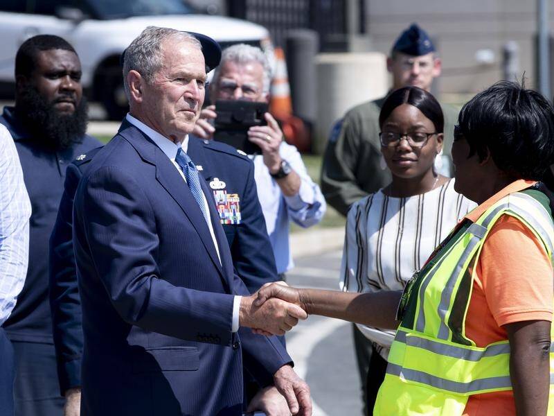 Former US President George W. Bush says protesters should be heard and racism addressed in the US.
