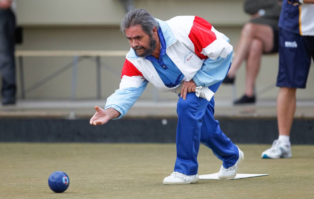  Windang's Carlos Hernandez sends down his bowl in the opening round of the Illawarra Singles at Figtree RSL Bowling Club, with the quarter-finals to be held at Warilla BC on Saturday afternoon. Picture: CHRISTOPHER CHAN