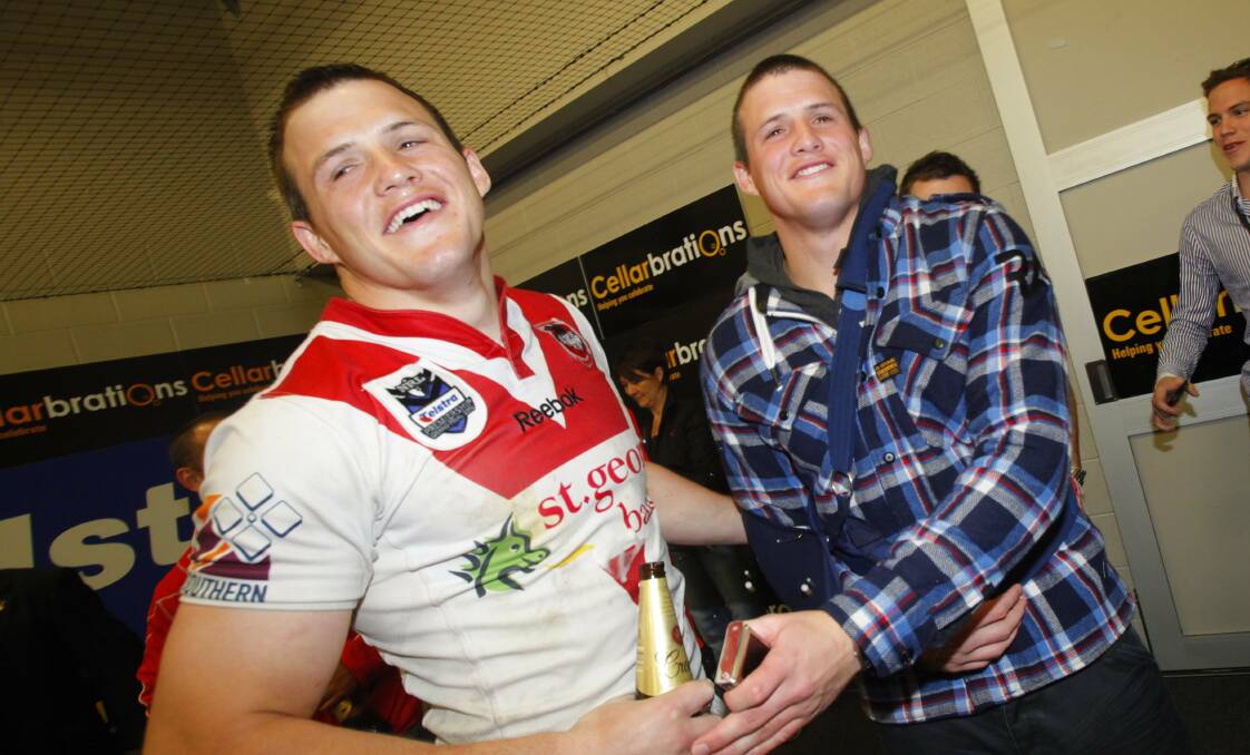Brett and Josh Morris after the Dragons’ NRL Premiership victory in 2010. Picture: DAVE TEASE
