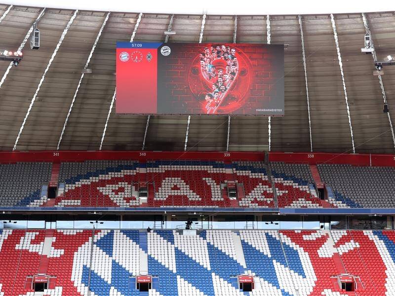 Bayern Munich's ninth straight Bundesliga triumph was marked on the scoreboard of their home stadium