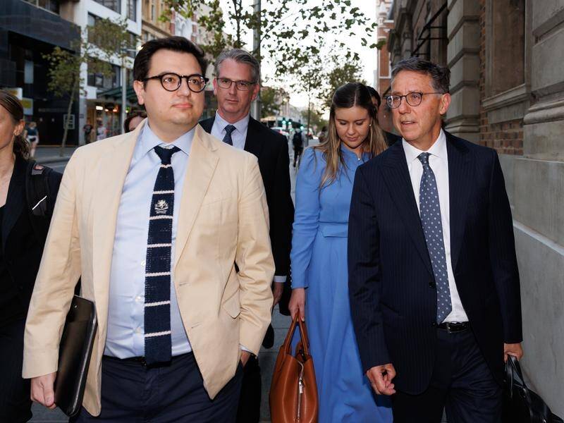 David Sharaz (left) tweeted he would no longer fight the defamation case because of the cost. (Richard Wainwright/AAP PHOTOS)