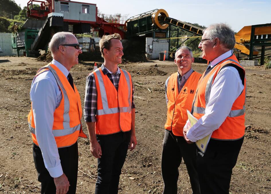 Charlie Emery, Michael McMahon, Terry Harkness and Peter Masterson inspect the completion of IRIIF funded work that has doubled the composting capacity at Soilco's organics recycling facility at Kembla Grange. Picture: GREG ELLIS