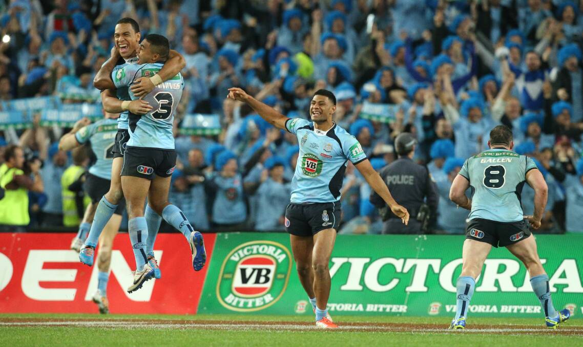 Will Hopoate, Michael Jennings, Daniel Tupou and Paul Gallen celebrate at full-time on Wednesday. Picture: CHRISTOPHER CHAN