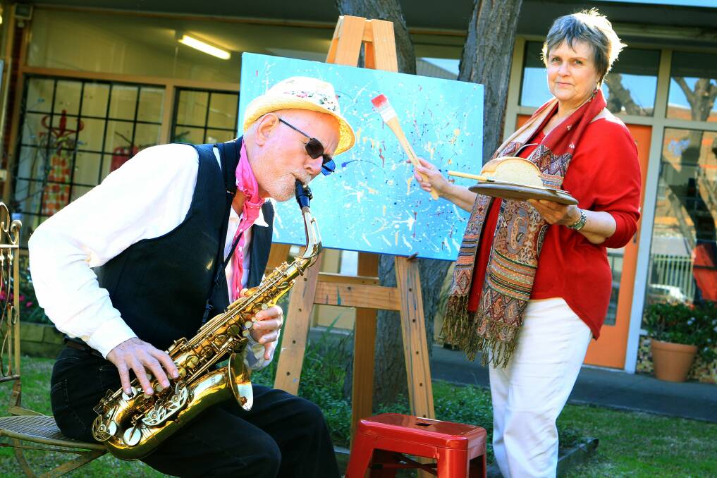 John Spira from the Con Artists and Curious Rendition Orchestra and Red Point artist Julie Telenta get ready for Jam ‘n Bread and Art on the Grass at Port Kembla on August 8. Picture: SYLVIA LIBER