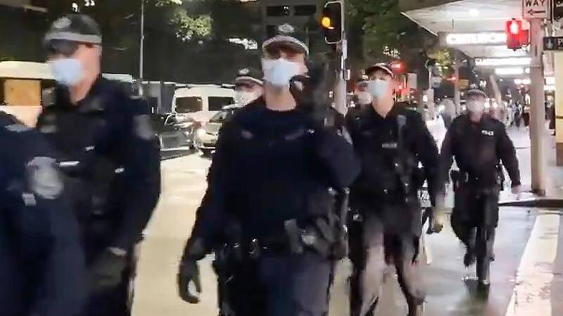 NSW Police have denied an officer was intending to signal white power, when he used the 'OK' sign.