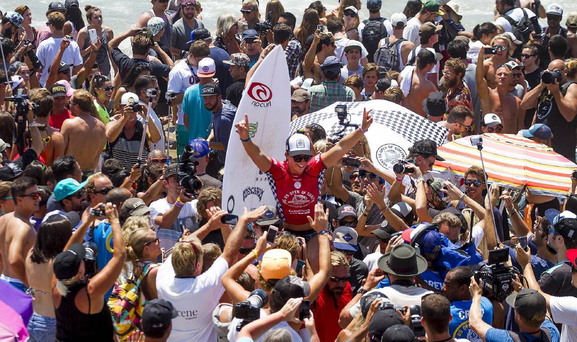 Culburra's Tyler Wright celebrates her US Open of Surfing victory at Huntington Beach, California. Picture: KENNY MORRIS/ASP