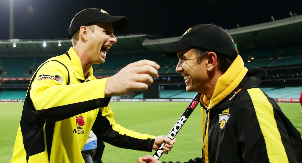 Justin Langer, right, seen here with West Australia captain Adam Voges, is staying put in Perth. He has rejected overtures to coach the England national team. Picture: GETTY IMAGES