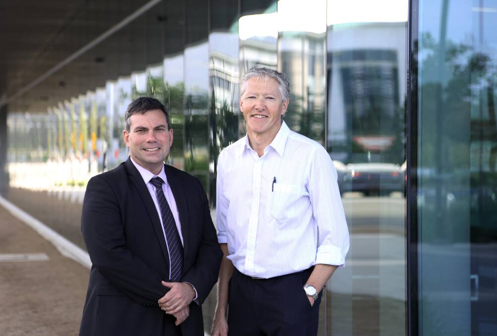 Mike Leask and Michael McKeogh can see the benefits of the Leadership Illawarra Program for business. Picture: GREG ELLIS