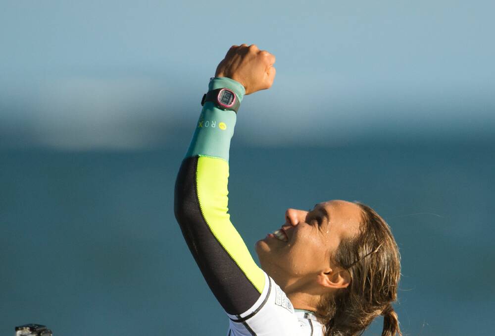 Sally Fitzgibbons, now second on the world title ladder, celebrates winning the Rio Women's Pro earlier this year.