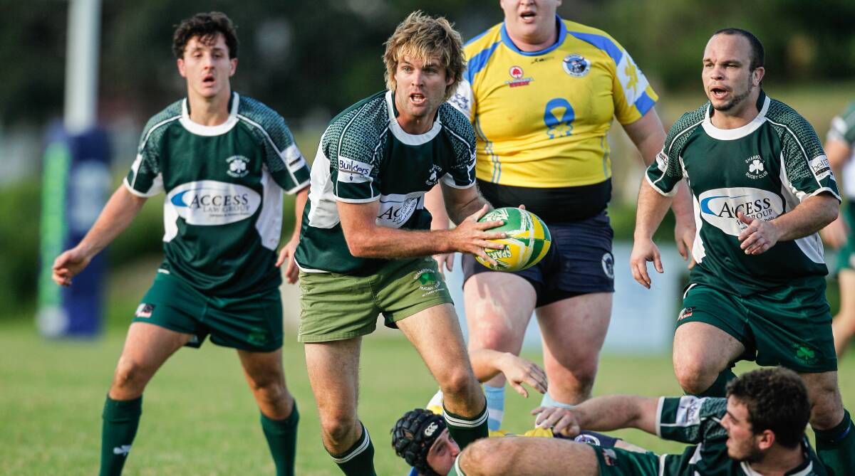 Shamrocks player Pete Campbell looks to clear the ball against Vikings on Saturday. Picture: CHRISTOPHER CHAN
