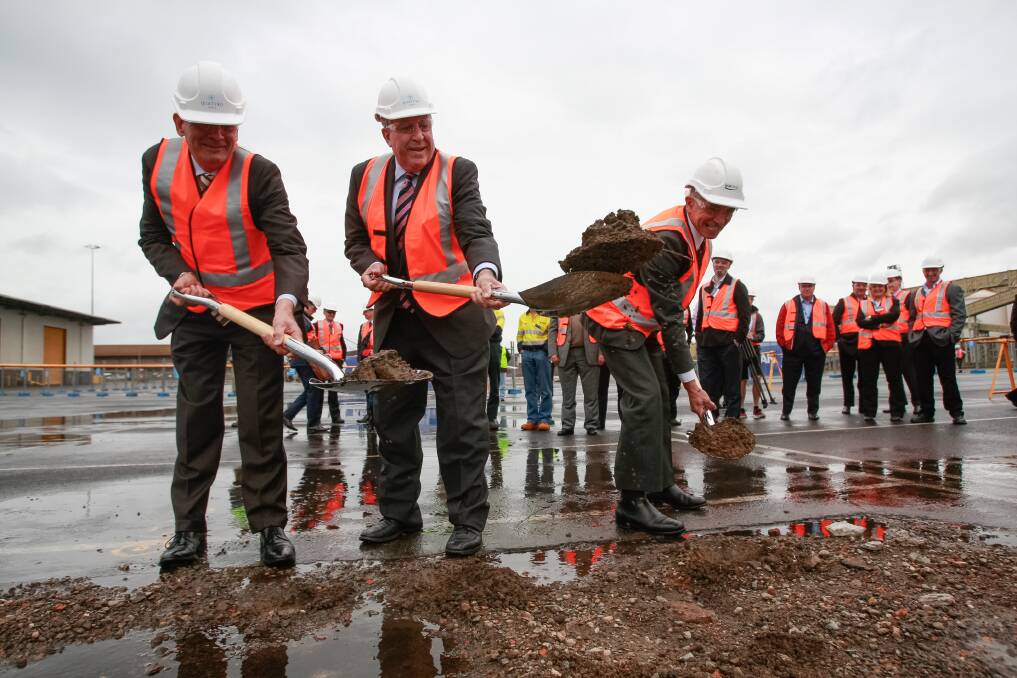 Quattro Ports chairman Tony Day, Minister for Roads and Freight Duncan Gay and NSW Ports' Dom Figliomeni turn the first sod of a $75 million upgrade at Port Kembla. Picture: CHRISTOPHER CHAN