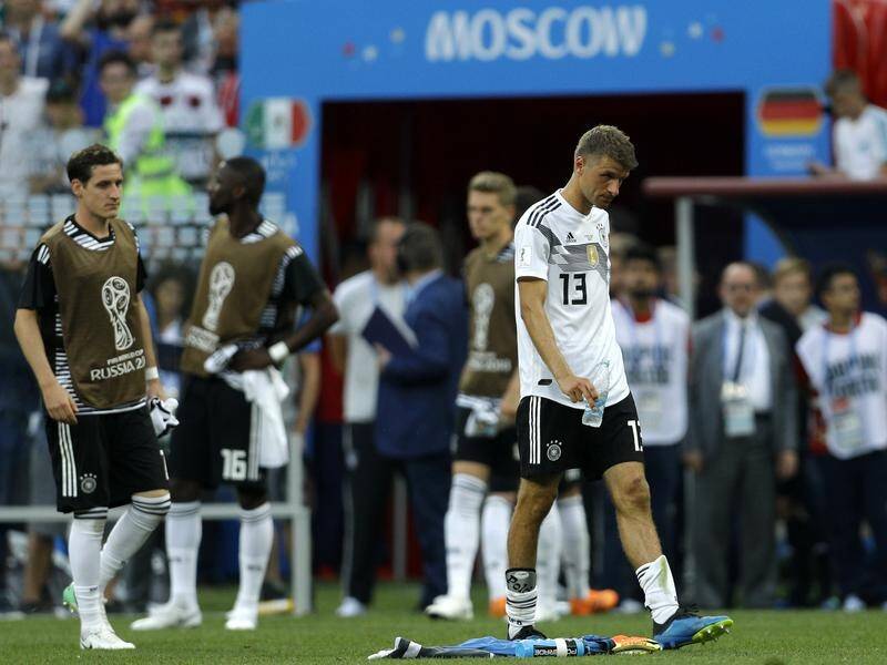 Germany's Thomas Mueller cast a disconsolate figure after their defeat to Mexico in Moscow.