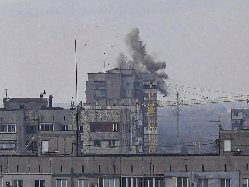 Ukrainian officials say Russian warplanes have again bombed the encircled port city of Mariupol.