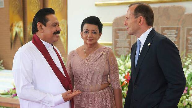 Prime Minister Tony Abbott speaks with Sri Lankan President Mahinda Rajapaksa. Australia has returned 41 asylum seekers to Sri Lankan custody despite Australia accusing the country of state-sponsored torture. Photo: Chris Jackson/Getty Images