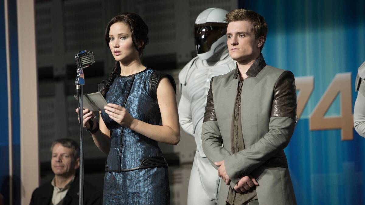 Jennifer Lawrence and Josh Hutcherson as Katniss and Peeta in The Hunger Games: Catching Fire. 