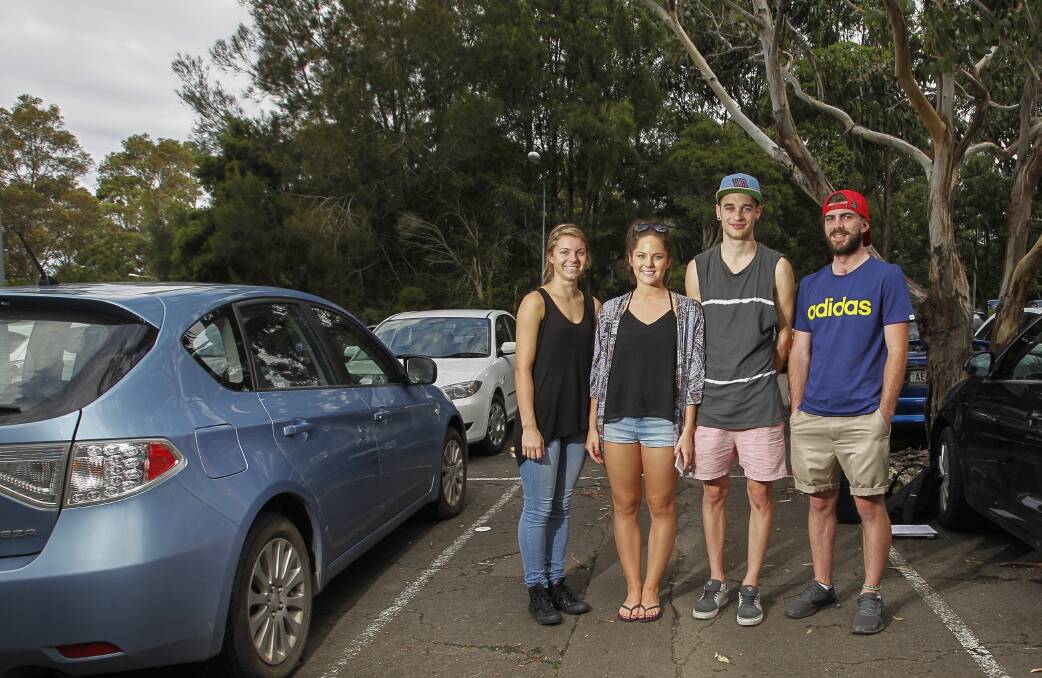 University of Wollongong students Abby Fawcett, Emily Bradwell, Toby Whittington and Joel Berrell, who car pool to UOW to save on the cost of parking. Picture: CHRISTOPHER CHAN