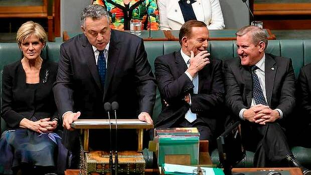 Tony Abbott with Industry Minister Ian Macfarlane as Treasurer Joe Hockey delivered his budget speech. Picture: ALEX ELLINGHAUSEN