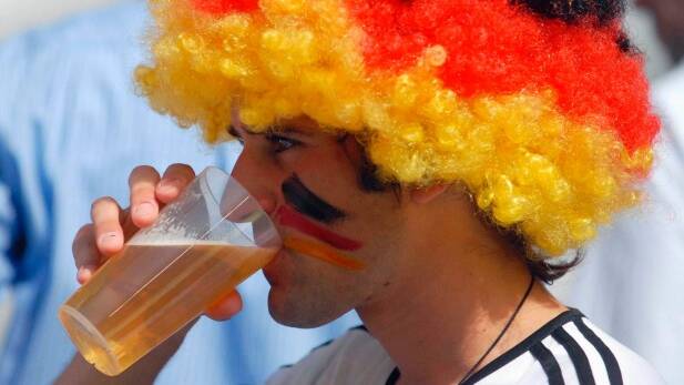 Level-headed: A German fan enjoys a beer at the football. Picture: BLOOMBERG