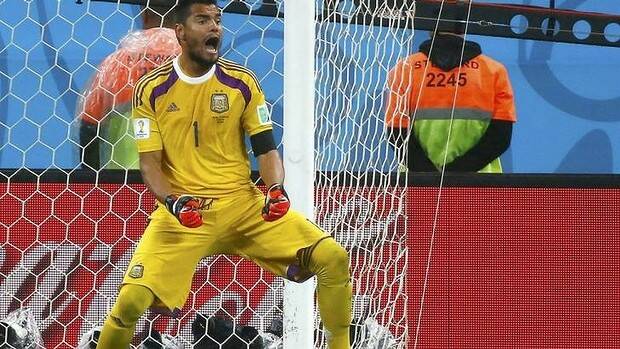 Sergio Romero saved two penalties in the shootout. Photo: Reuters