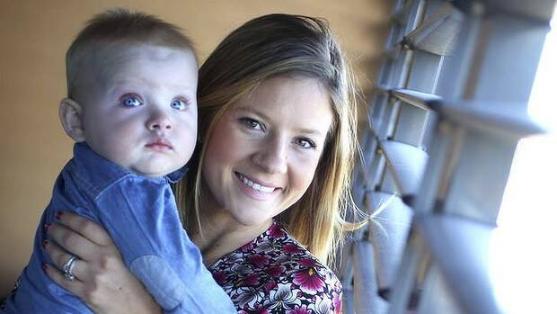 Tegan Couper, pictured with baby Hype, won two court cases against CBA. Picture: JAMES ALCOCK