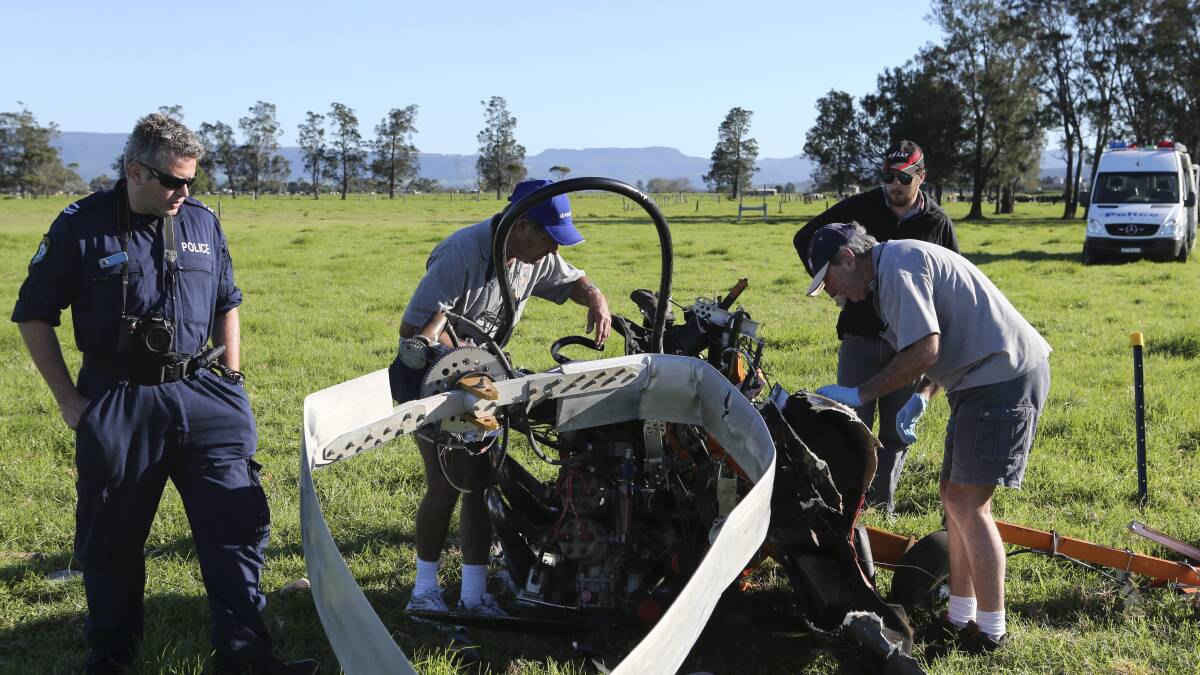 Investigators at the site of a gyrocopter crash on Sunday. Picture: SOUTH COAST REGISTER