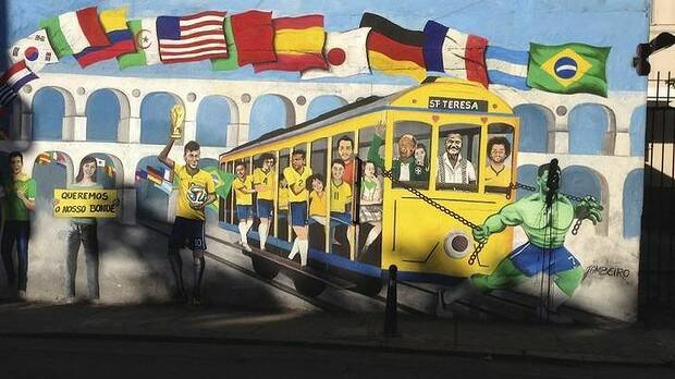 Premature celebration: A mural depicting Neymar holding the World Cup trophy on a wall in Santa Teresa, Rio de Janeiro. Photo: Andrew Webster