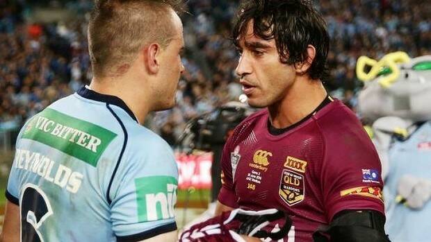 Josh Reynolds and Johnathan Thurston shake hands after their spiteful Origin clash. Photo: Getty Images
