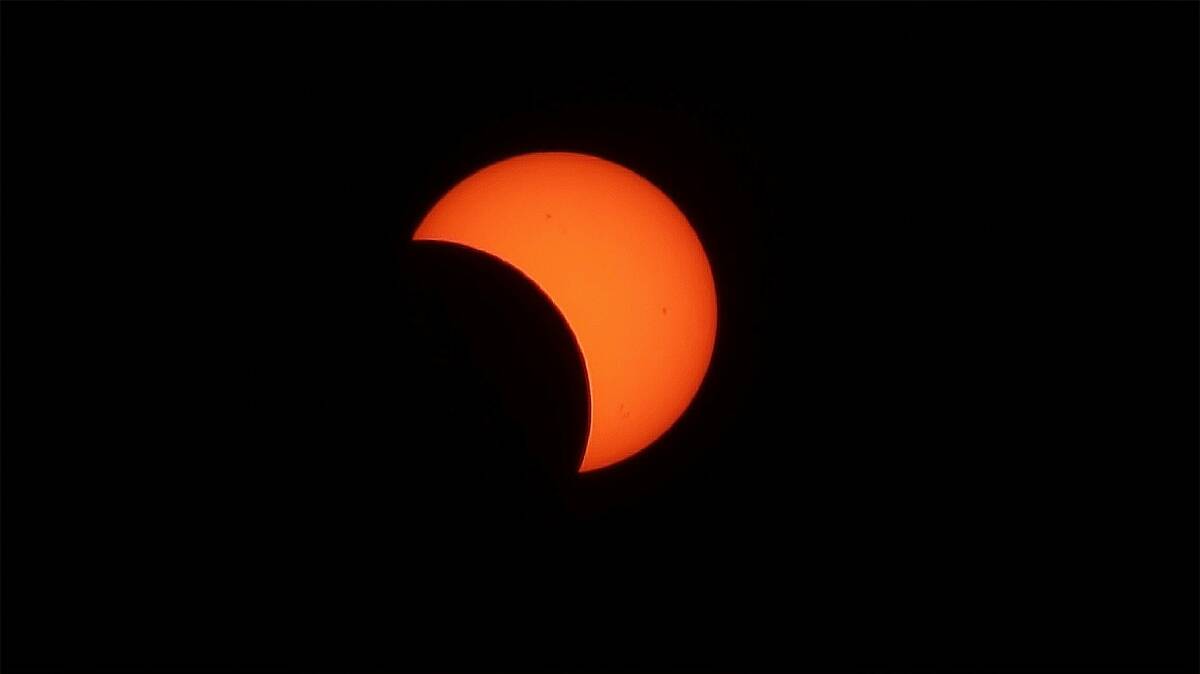 A partial solar eclipse in 2012. Picture: JIM KATSIFOLIS