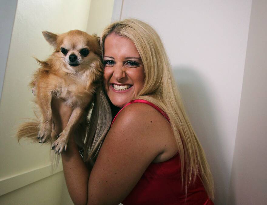 Tanya Boyle who plays Elle Woods with Bruiser in MoonGlow’s Legally Blonde. Picture: SYLVIA LIBER