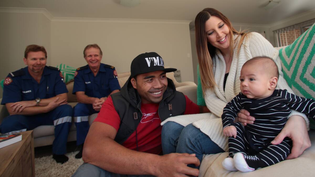 Robert Shaw and Tony White with new parents Tovio,  Kristy and Beniah Emani. Picture: ADAM McLEAN