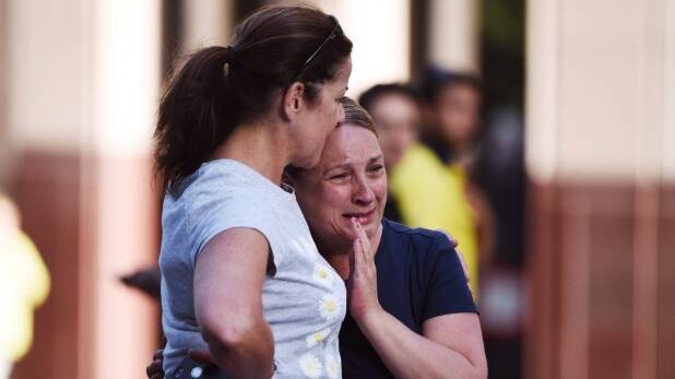 Terri Lucia, in the blue top, knew one of the victims. Photo: Nick Moir