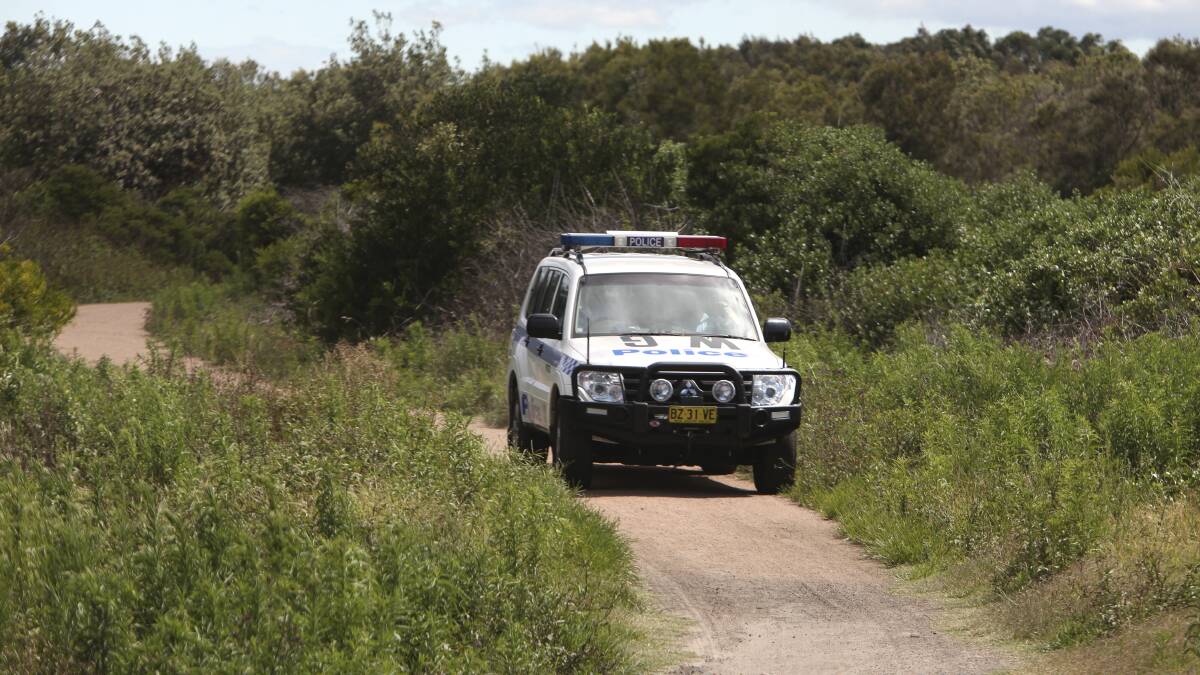Police leave Puckeys Estate Reserve where a body was found. Picture: KIRK GILMOUR