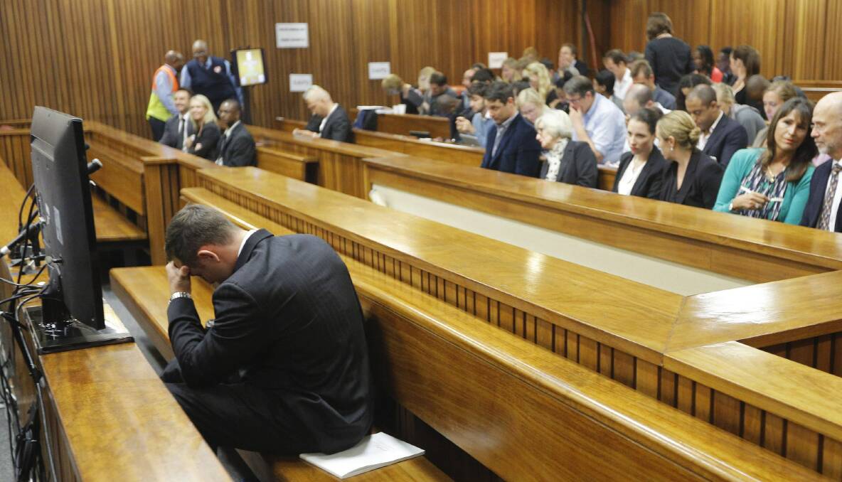 Oscar Pistorius sits in the dock at the North Gauteng High Court in Pretoria. Picture: REUTERS