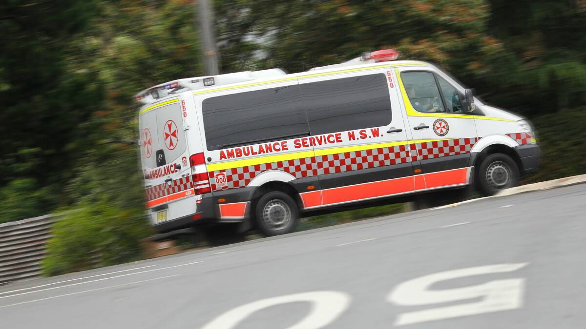 Mount Ousley crash: man in his 60s trapped