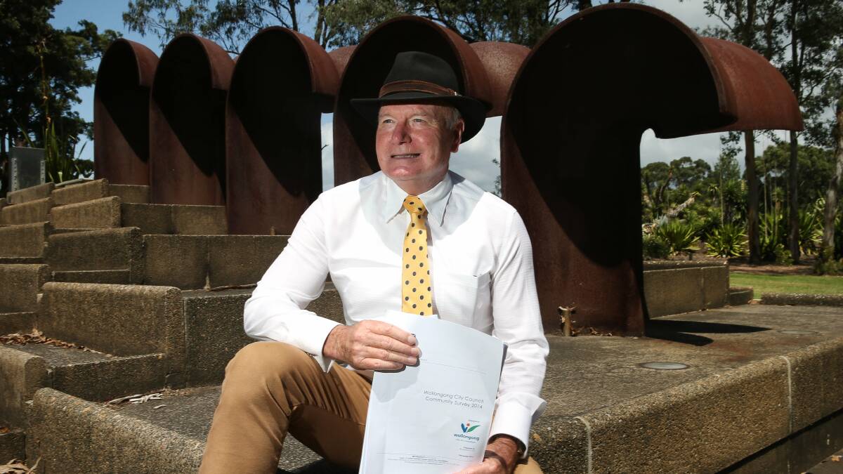 Wollongong Lord Mayor Gordon Bradbery  at  Wollongong Botanic Garden with results of the community survey. Picture: KIRK GILMOUR