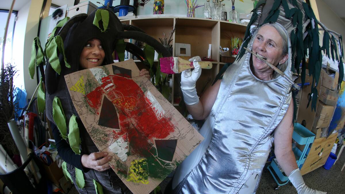 Spring Into Corrimal organisers Juliet Scrine and Susan Kennedy showcase some of the fun art activities that will feature at the popular street festival. Picture:  ROBERT PEET