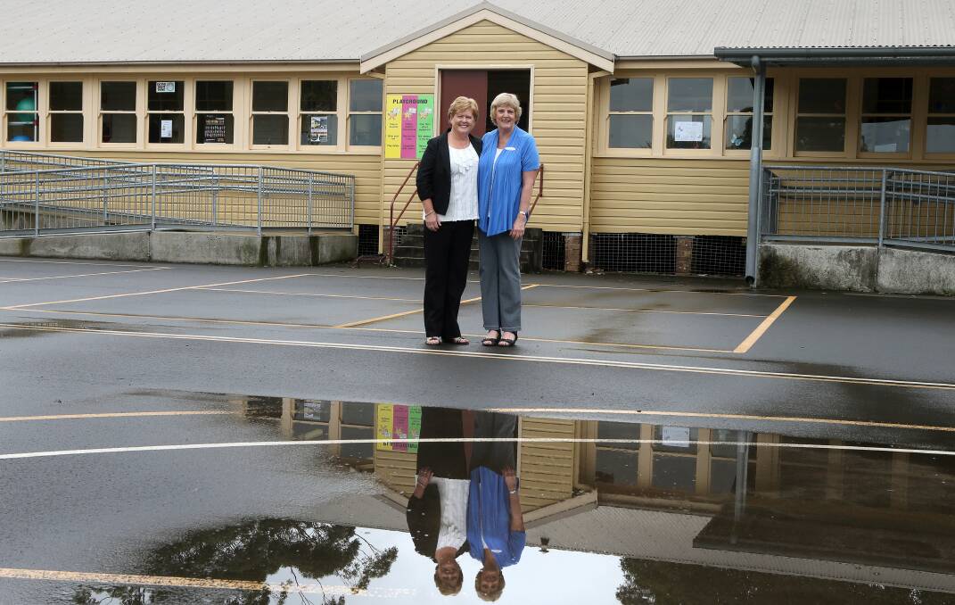 Vicki Smede and Lyn McCluskey are organising a community celebration on April 5 for Towradgi Public School’s 60th anniversary. Picture: KIRK GILMOUR