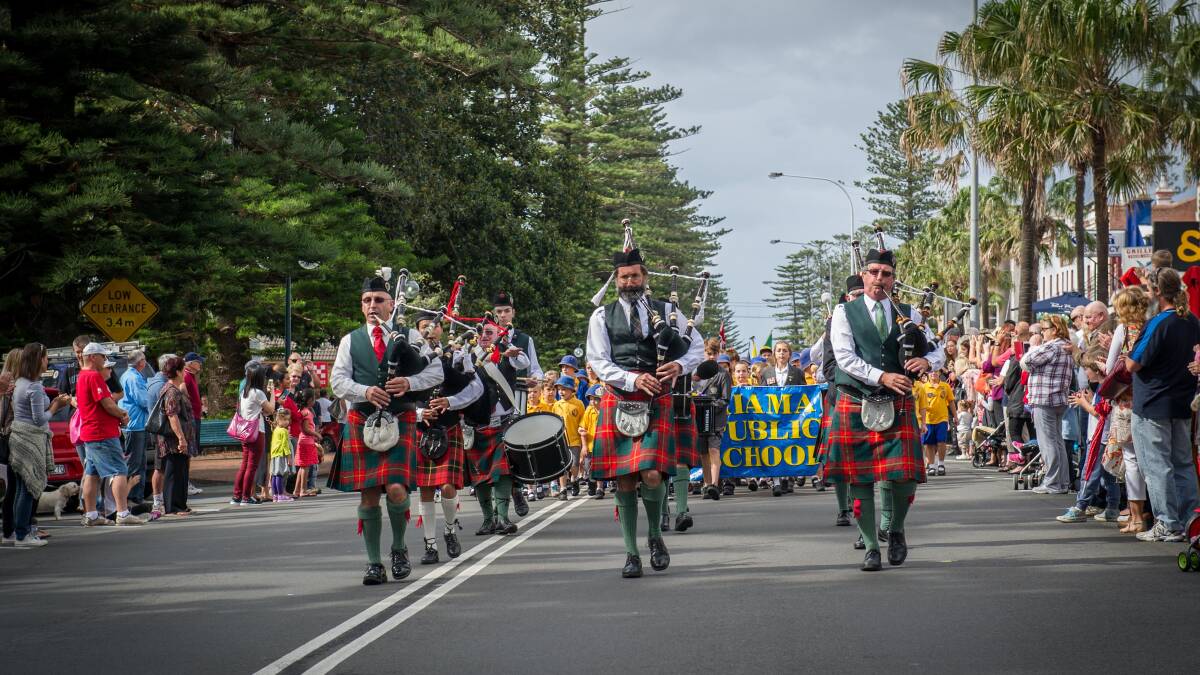 Kiama residents gather along Terralong Street to honour those who have served in conflict. Picture: ALBEY BOND