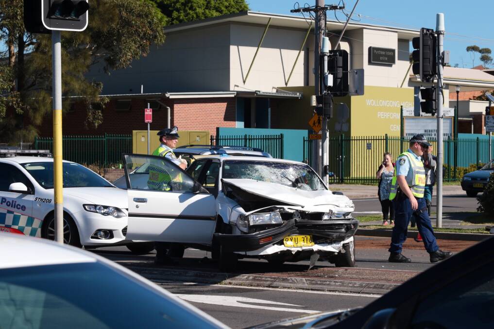 Wollongong police attend a two vehicle accident in North Wollongong. Picture: ADAM McLEAN
