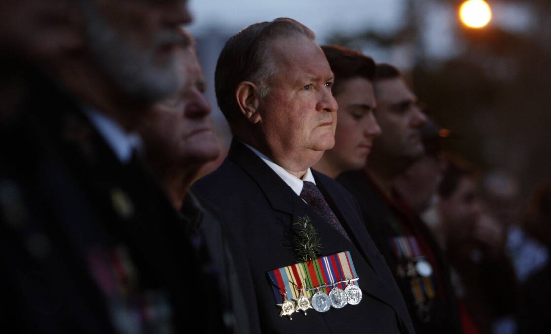 Warilla man Gordon Edwards wears his fathers medals who served in WWII. Picture: ANDY ZAKELI