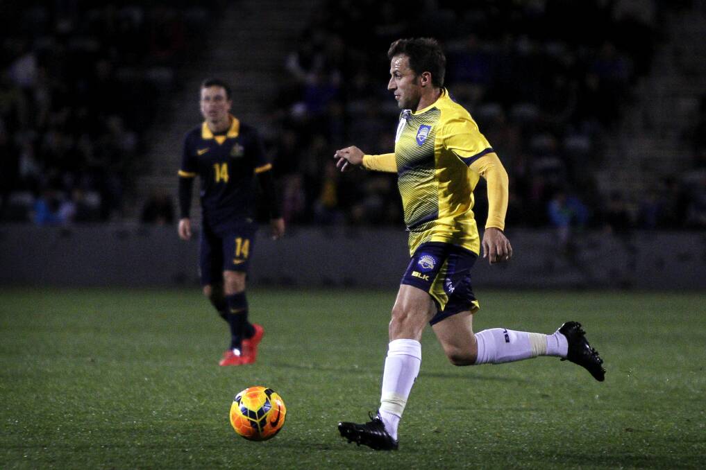 All Stars player Alessandro Del Piero looks to round the young Socceroos defence. Picture: SYLVIA LIBER