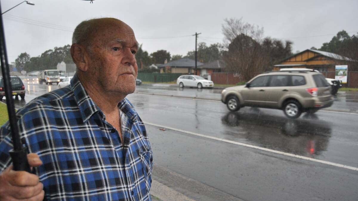 Albion Park Rail resident Noel Paine does not see the point in building another petrol station along the Princess Highway. Picture: ELIZA WINKLER