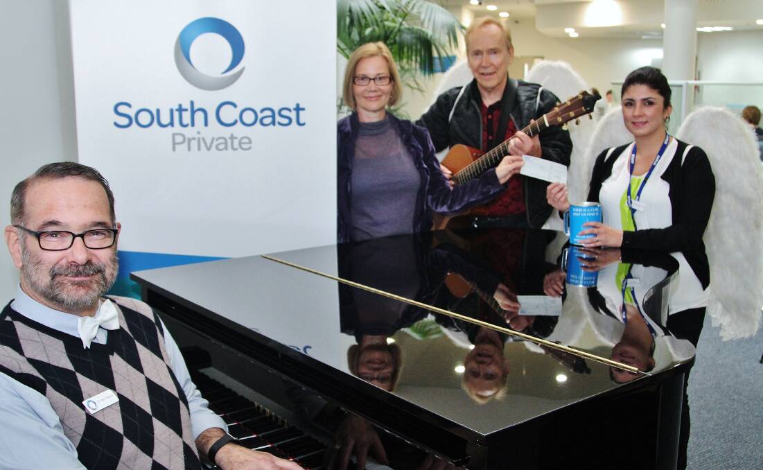 Associate Professor Irwin Pakula, Director of Nursing general manager Kim Capp, singing angel Graham Wilson and Merrylord Harb-Azar were in good voice at South Coast Private Hospital.  Picture: GREG ELLIS