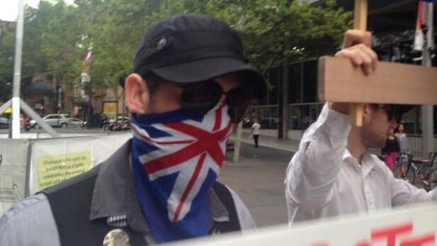 The four men were shouted down by members of the public who had gathered in Martin Place. Picture: NICOLE HASHAM
